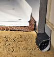 Alpena installation of SilverGlo™ insulation with our crawl space pipe, drainage matting, floor insulation, and crawl space moisture barrier.