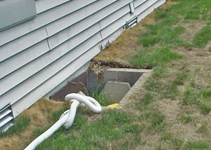 Fiberglass dripping off of the ceilings of a Kalamazoo crawl space