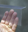 Closeup of a clear plastic covering on a Niles crawl space block wall