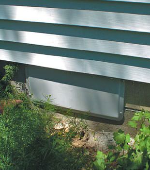 A gray crawl space vent cover in Coldwater