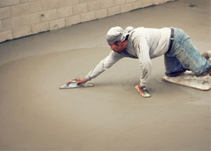 smoothing out the grout in a slab releveling project in South Bend