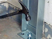 Mounting a foundation channel anchor installation to the floor in South Bend.