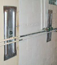 A foundation wall anchor system used to repair a basement wall in Hillsdale