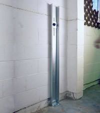 A failing foundation wall repaired with a foundation wall channel anchor system in a Elkhart home.