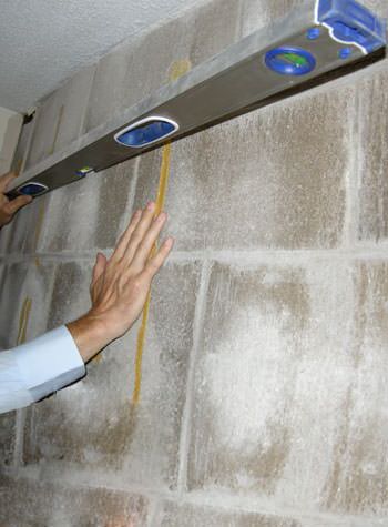 severe foundation wall failure symptoms of a basement wall in Ithaca