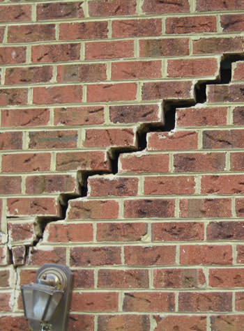 major cracking of a brick foundation wall in Gaylord