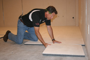 Insulated basement subfloor installation in Lansing