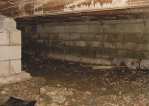 Rotting, decaying crawl space wood damaged over time in [city]