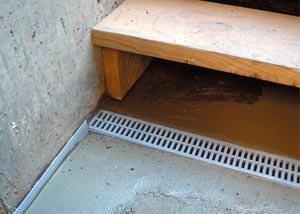 a hatchway entrance in Goshen that has been protected from flooding by our TrenchDrain basement drainage system.