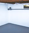 Kalamazoo, MI & IN wet basement wall covering that tucks into a perimeter drainage system